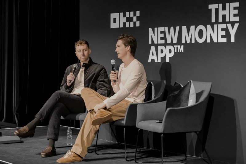 James Baldwin moderating an on-stage conversation for OKX