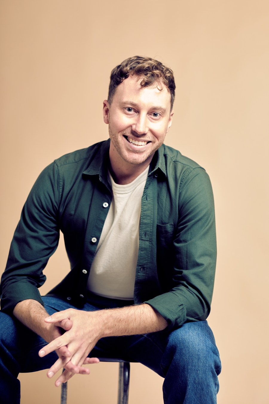Headshot of James Baldwin, motorsport presenter